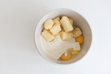 the process of making homemade cupcakes, top view. Mix ingredients. Step two