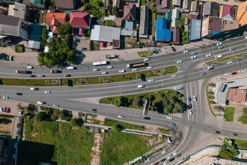 Aerial top down view of road bridge with traffic, road infrastructure. Resolving of car traffic jam.