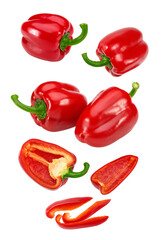 flying red sweet bell peppers isolated on white background. clipping path