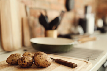 Fresh, sweet potatoes on the kitchen table