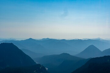 Silhouettes of mountains under the blue clear sky