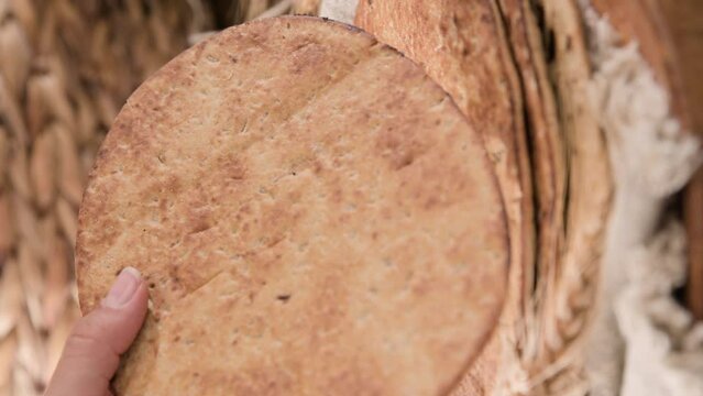 Spianata Sarda. Typical tortilla bread in italy Sardinia region. Baking bread Thin round with different flour. High quality 4k footage. Vertical video