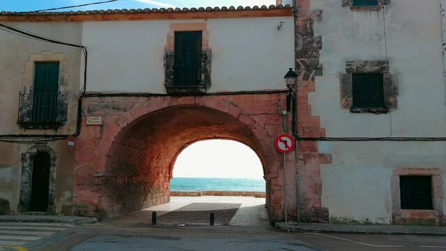 Arch that leads to the promenade and Altafulla beach. Tarragona