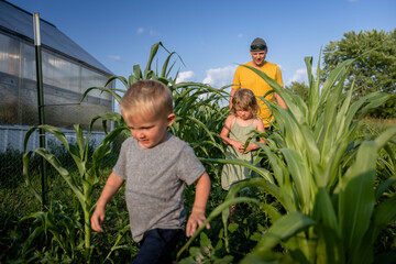 Marine veteran at home with family outside in garden.
