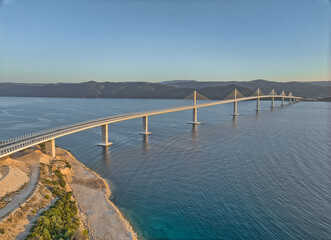 Aerial view of the Peljesac bridge at dusk