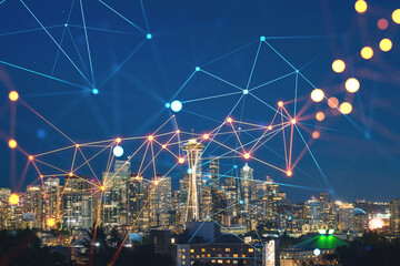 Naklejka premium Seattle skyline panorama from Kerry Park. Skyscrapers of financial downtown at night, Washington, USA. Social media hologram. Concept of networking and establishing new people connections