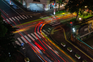 Car lights on crossroad in Okayama Japan