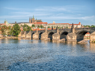 Fototapeta premium View with the Charles Bridge main touristic attraction with the Prague Castle in the background