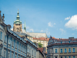Fototapeta premium View with the tower of St. Vitus Cathedral in Prague Castle. Gothic medieval architecture