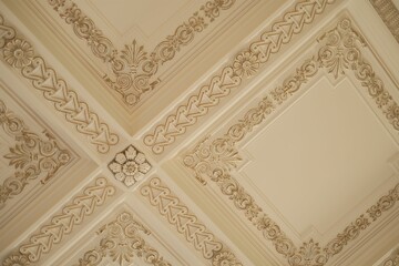 Beautifully decorated ceiling with carved details