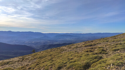 Obraz premium Landscape with green mountains and traditional towns