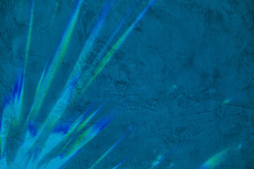 Abstract crystal light glares and shadow on turquoise blue concrete wall texture. Abstract nature...