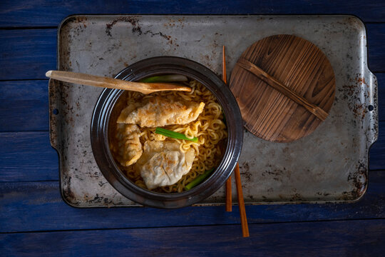 Ramen with potsticker and egg