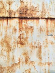 Corroded metal background. Rusty metal background with streaks of rust. Rust stains. Rystycorrosion.