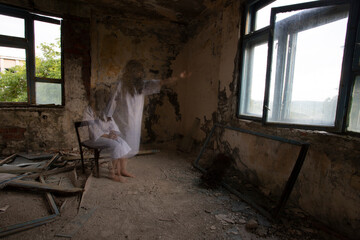 Scary ghost woman in haunted house