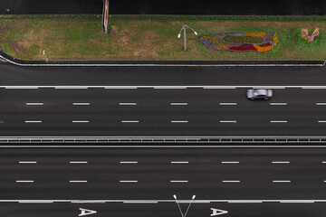 top view of the highway with a passing car