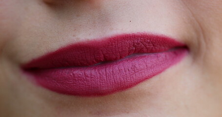 Naklejka premium Woman lips smiling closeup macro. Girl red lips close-up