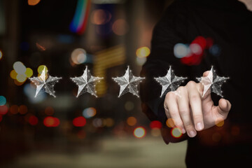 Businessman click on virtual computer screen for 5 star rating.