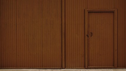Fototapeta premium brown industrial metal door as background