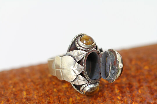 sterling silver ring with three tiger eye stones