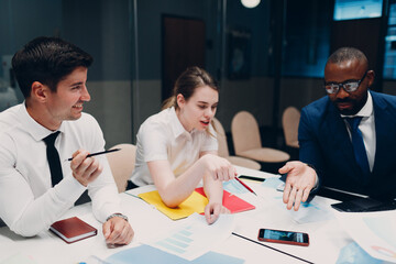 Businessman and businesswoman team at office meeting. Business people group conference discussion with boss.