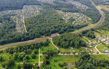 Aerial view of the green summer forest with trees