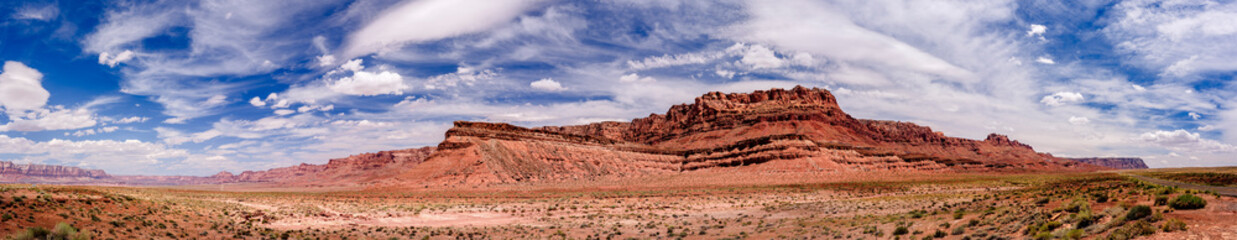 Fototapeta na wymiar Clouds form over the Vermilion Cliffs during summer in northern Arizona