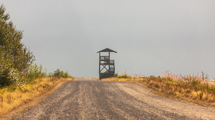 Bird watching tower in the park. Hunting or birdwatching tower