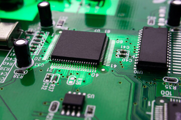 macro photography of integrated modern circuit on printed circuit board.