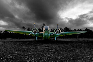 A Lockheed Hudson Bomber rests in an open field in selective colour at the North Atlantic Aviation...