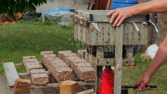 Making Paper Bricks from waste cardboards. ProRes 422HQ 12bit Mov. Energy crisis theme.