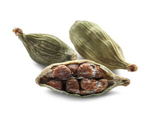Dry green cardamom pods on white background, closeup