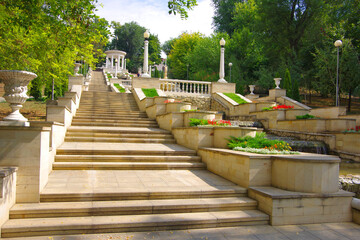 Moldova, Kishinev.  View of a white gazebo with columns and steps leading up.