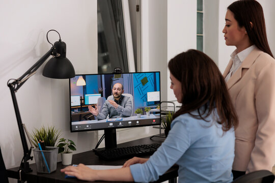 Co Workers Talking With Business Partner On Videocall, Discussing Startup Project Strategy. Employees Chatting With Client On Videoconference, Company Colleagues Teleconference