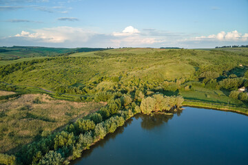 Aerial view of fish hetching pond with blue water in aquacultural area