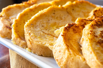 French Toast made with Homemade Asiago Cheese Bread 