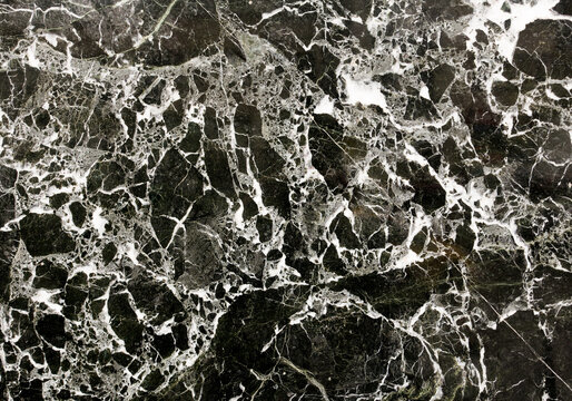 Photo of natural black marble with abstract pattern