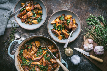 Sausage, Potato and Kale Stew in Pot and Bowls
