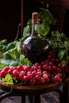autumn composition with wine and green pumpkins and grapes. Concept of Thanksgiving