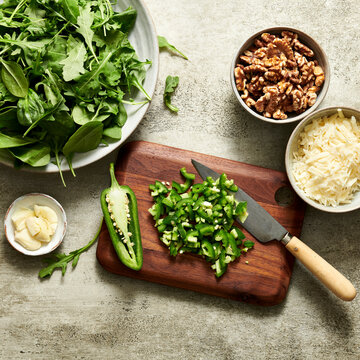 Ingredients for Spicy Pesto on a chopping board