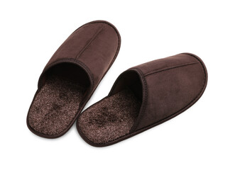 Pair of brown slippers on white background