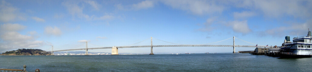 Fototapeta na wymiar San Francisco side of Bay Bridge with Oakland in the distance Panoramic