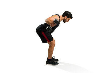 Active latin man working out doing dumbbell row exercises