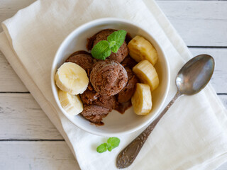 Healthy raw vegan banana and chocolate ice cream (icecream or nicecream) - healthy vegetarian diet,...