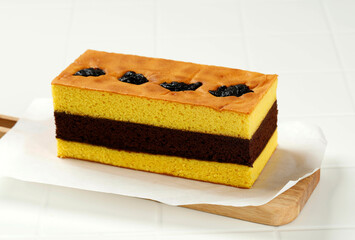 Spiku or Lapis Surabaya, Indonesian Three Layer Cake with with Strawberry Jam Between the Layer.