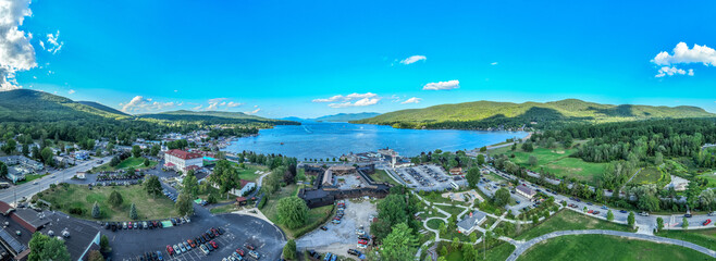Panoramic aerial view of Lake George New York popular summer vacation destination with colonial wooden fort William Henry - obrazy, fototapety, plakaty