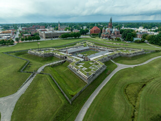 Aerial view of star shaped reconstructed 
Fort Stanwix in Rome New York with four angled wooden...