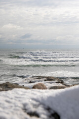 Winter Ocean Waves Crashing Along a Rocky Coastline