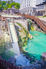 Yubatake onsen, hot spring wooden boxes with mineral water in Kusatsu onsen, Gunma prefecture, Japan
