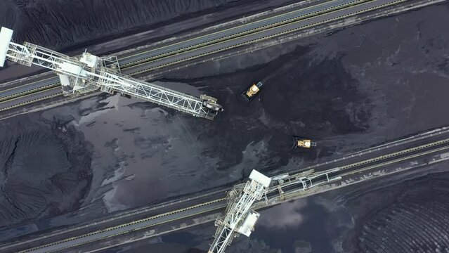 Coal terminal with technics working in it.